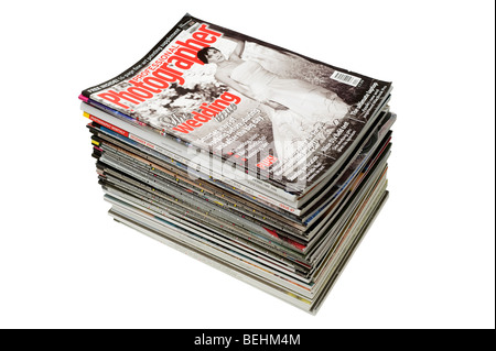 A neat pile of colourful magazines Stock Photo
