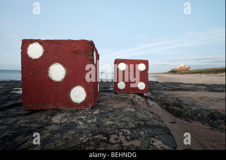 Two giant concrete blocks painted as dice on Bamburgh Beach in Northumberland,England, 'North East','Great Britain', Stock Photo