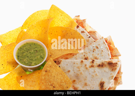 Close-up of quesadillas with tortilla chips and salsa verde Stock Photo