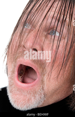 Wild-looking man with surprised look on his face. Stock Photo