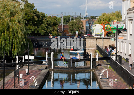 People sitting by the Canal in Camden London Stock Photo - Alamy