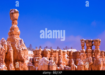 Morning light and fresh powder on Thor's Hammer and hoodoos below Sunrise Point, Bryce Canyon National Park, Utah Stock Photo