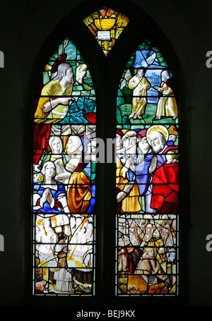 A stained glass window made up of fragments of 16th and 17th century French and german glass. St Mary Magdalene Church, Warham, Norfolk Stock Photo