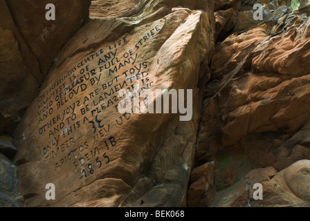Gargoyles carved into sandstone cliffs beside the River Eden at ...