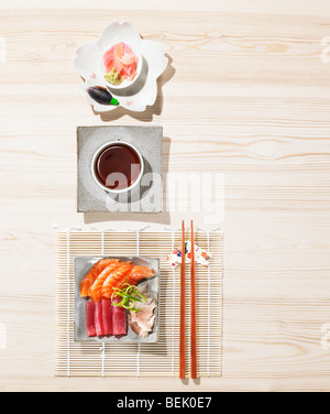 sushi served with ginger, soy sauce, wasabi and miso Stock Photo