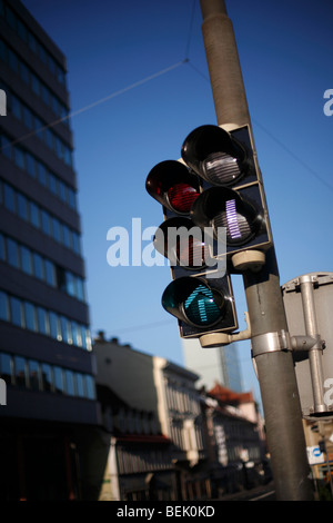 A traffic signal or traffic light showing green in the city of Graz in Austria Stock Photo