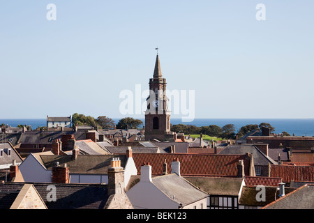 High view across rooftops to the Town Hall clock in border town centre. Berwick upon Tweed, Northumberland, England, UK. Stock Photo