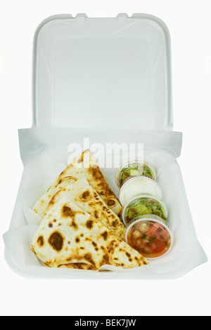High angle view of quesadillas with assorted condiments in a box Stock Photo