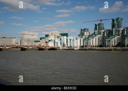 Looking across the River Thames to Vauxhall Bridge, MI6 Building and St George's Wharf, Vauxhall, London, UK Stock Photo