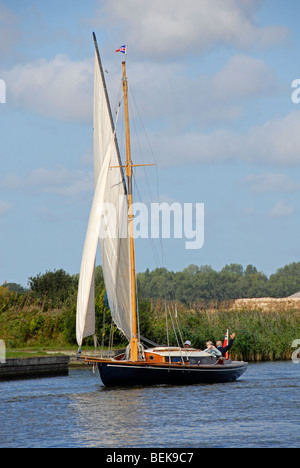 Sailing boat on River Thurne, Norfolk Broads Stock Photo