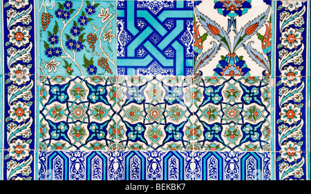 Ancient Ottoman Iznik glazed ceramic tile panel incorporating geometric stars saz leaves hatayi rosettes 16th century Rüstem Pasha Mosque   Istanbul. Stock Photo