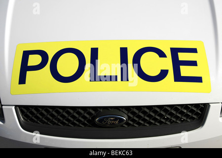 Close up of the logo on a police car saying Police Stock Photo