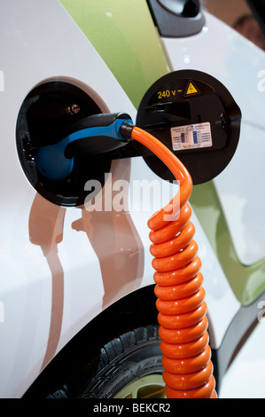 Plug in electric SMART car being recharged at the Frankfurt Motor Show 2009 Stock Photo