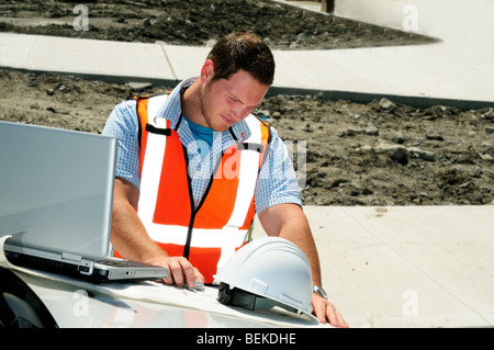 Road Engineer Checking Plans Stock Photo