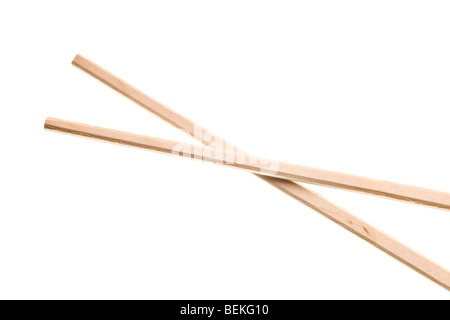 disposable wooden Chinese chopsticks isolated on white Stock Photo