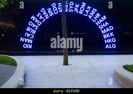 Three letter IATA codes for some of the world's airport destinations used as part of  art design in a plaza outside Heathrow T5 Stock Photo