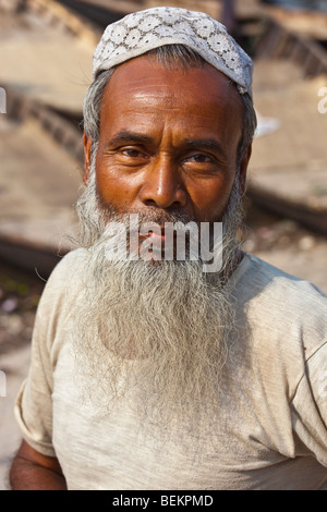 Portrait of old bearded Bangladeshi man by Shait Gumbad Mosque in ...