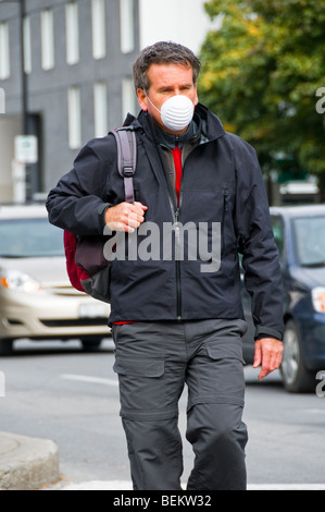 Man wearing protective mask Stock Photo
