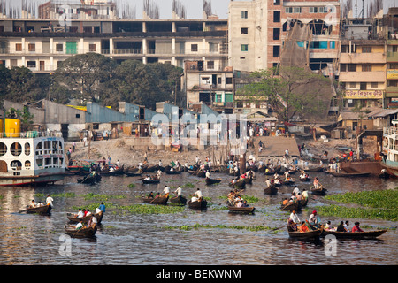 Dingi Nouka or small rowboat taxis on the Buriganga River in Dhaka Bangladesh Stock Photo