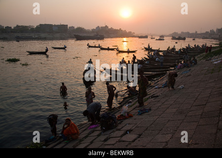 Bathing and boating in the extremely poluted waters of the Buriganga River in Dhaka Bangladesh Stock Photo