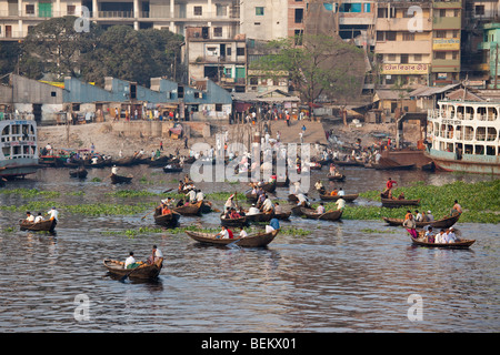 Dingi Nouka or small rowboat taxis on the Buriganga River in Dhaka Bangladesh Stock Photo