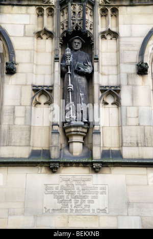 Statue of James Moorhouse, former Bishop of Manchester on exterior of Manchester Cathedral, England, UK Stock Photo