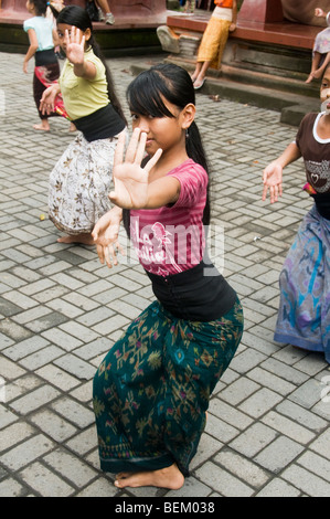 girl practicing traditional Legong dance in Ubud in Bali Indonesia ...