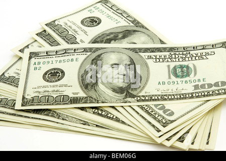 Stack of hundred dollar bills isolated on white Stock Photo