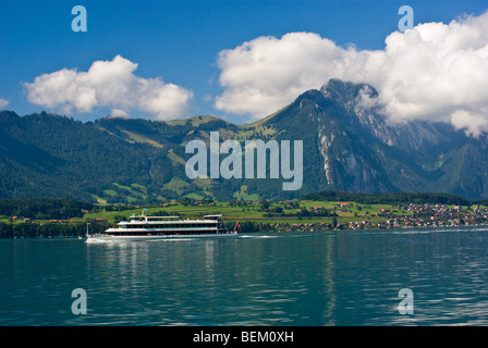 Lake Thun in the Swiss town of Thun. Alps mountains.  Thunersee. Tourism Stock Photo