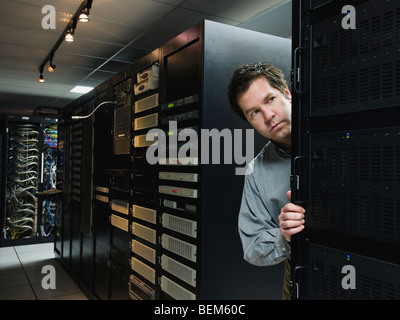 Man working in data center Stock Photo