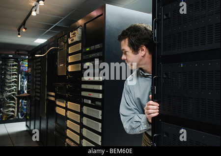 Man working in data center Stock Photo