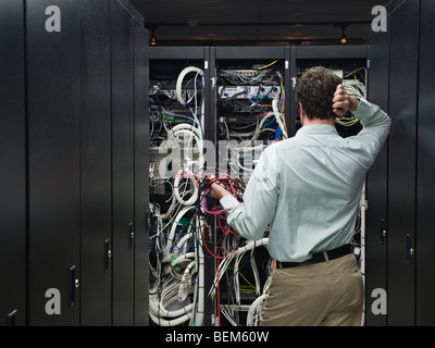 Man working in data center Stock Photo