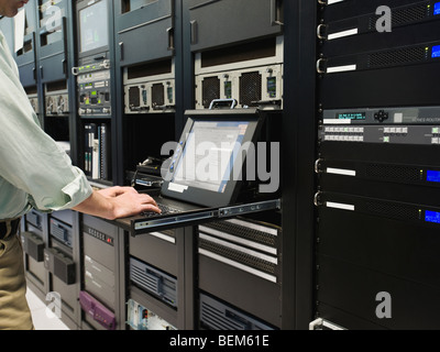 Man working in data center Stock Photo