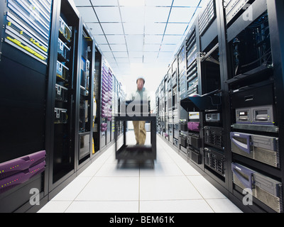 Man working in data center Stock Photo