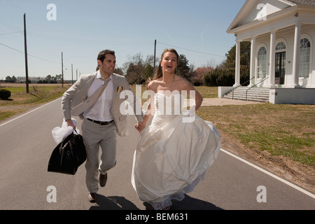 Married couple running Stock Photo