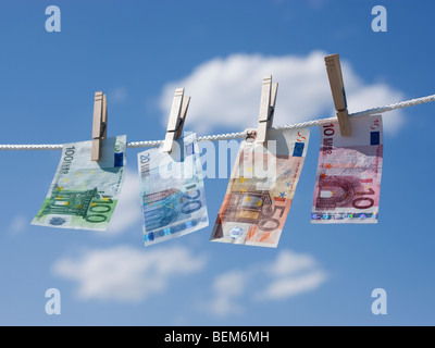 Euros on clothes line Stock Photo