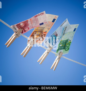 Euro on clothes line Stock Photo