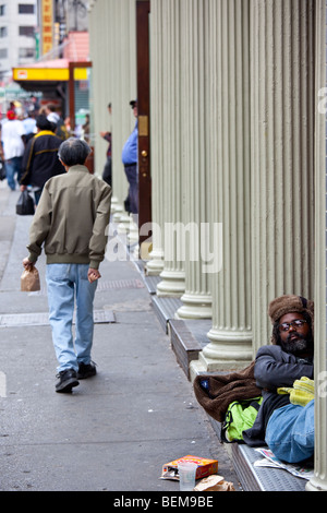 Homeless man on a city street Stock Photo - Alamy