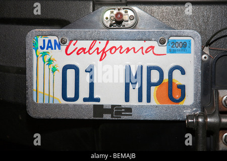 Close up of '01 MPG' (One Mile Per Gallon) custom plate on a gas guzzling Hummer H2. Stock Photo