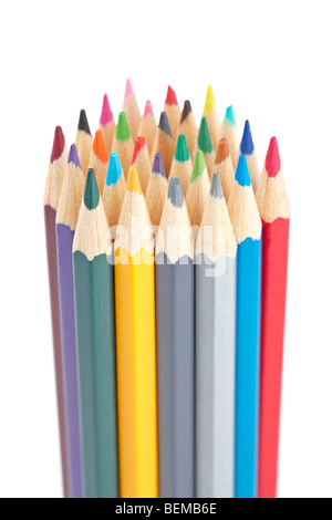 Assortment of coloured pencils isolated on white background. Shallow depth of field Stock Photo