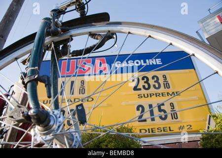 An USA Gasoline price list viewed through a bicycle wheel on March 24, 2009. Los Altos, California, USA Stock Photo