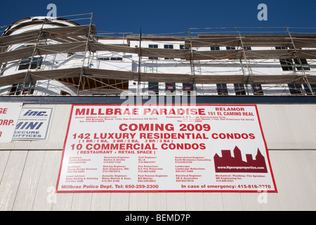 A low angle view of an advertising sign promoting a transit orientated housing development. Millbrae, California, USA Stock Photo