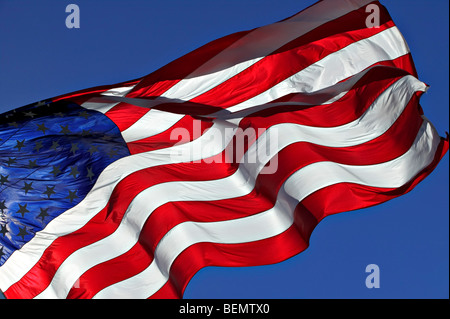 The American flag waving in the breeze. Stock Photo