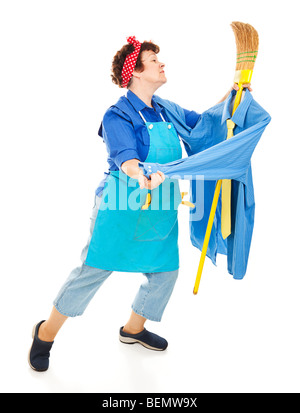 Lonely housewife or maid dancing with her broom, imagining it is a man. Full body isolated on white. Stock Photo