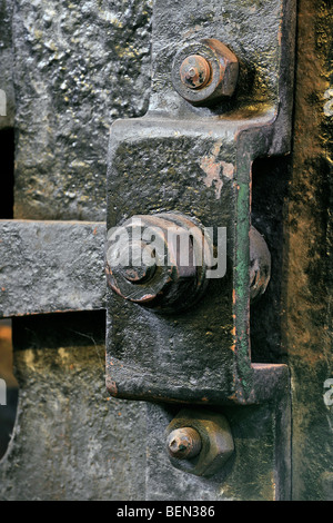 Vintage hexagon nut and screw of 19th century metalworking machinery at the Bois du Cazier coal mine museum, Marcinelle, Charleroi, Belgium Stock Photo