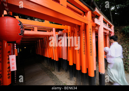 Double Torii lining footpath leading to the Inner Shrine of Fushimi Inari Taisha Shrine. Kyoto. Kansai. Japan Stock Photo