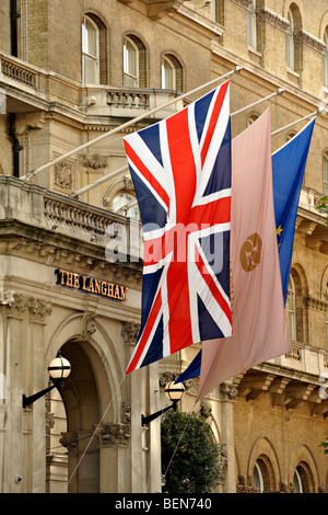 LONDON, UK - OCTOBER 10, 2009: Flags outside the Langham Hotel in Portland Place Stock Photo