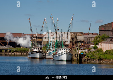 Shrimp boats are docked on the Sampit River in Georgetown, South Carolina. Stock Photo