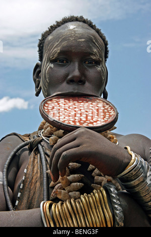 Mursi woman with clay plate in her lower lip, Omo Valley, Ethiopia ...