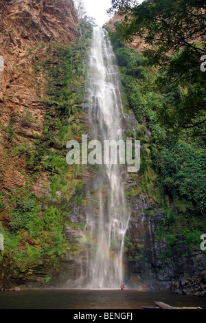 Black family having fun while bathing under the Wli Waterfall / Wli falls in Ghana, West Africa Stock Photo